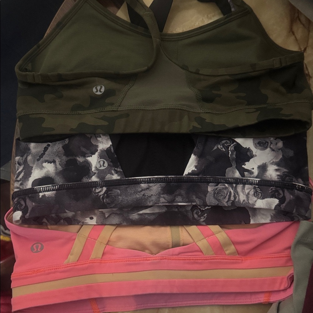3 lululemon athletica Camo Green, Black Floral, Pink Sports Bras all size 6